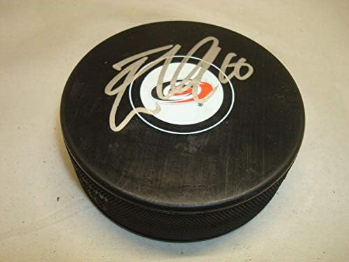 Elias Lindholm assinou a Carolina Hurricanes Hockey Puck autografado 1A - Pucks autografados da NHL