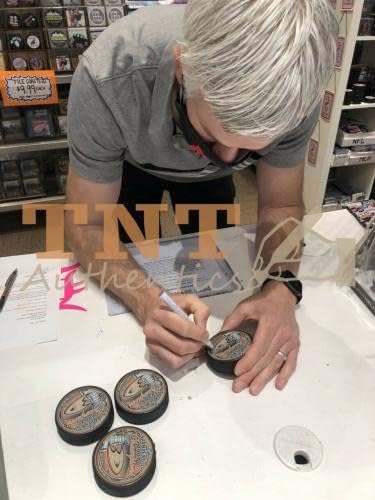 Drew Miller assinou e inscreveu Anaheim Ducks 2007 Stanley Cup Champions Puck - Pucks autografados da NHL