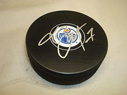 Laurent Brossoit assinou o Edmonton Oilers Hockey Puck autografado 1D - Pucks autografados da NHL