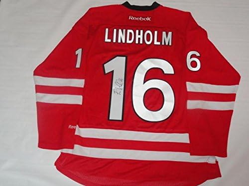 Elias Lindholm assinou o 16 Carolina Hurricanes Jersey Licenciou JSA COA - Jerseys autografadas da NHL