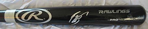 Eric Hosmer autografou Black Big Stick Bat com prova, imagem de Eric assinando para nós, campeão da World Series, PSA/DNA