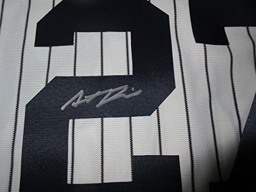 Austin Romine autografou a camisa de riscos do New York Yankees com prova, foto de Austin assinando para nós, New York Yankees, jogo de futuros de 2010